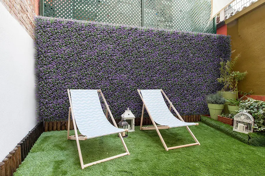 Artificial Boxwood Hedges: Safeguarding Privacy with Style 2 artificial hedge panels for lounge area