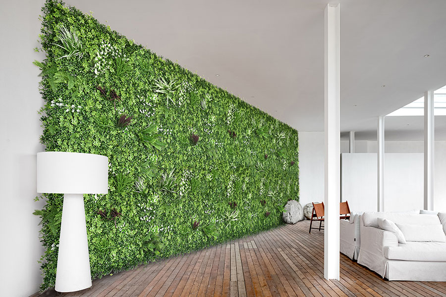 artificial greenery wall in hotel lobby