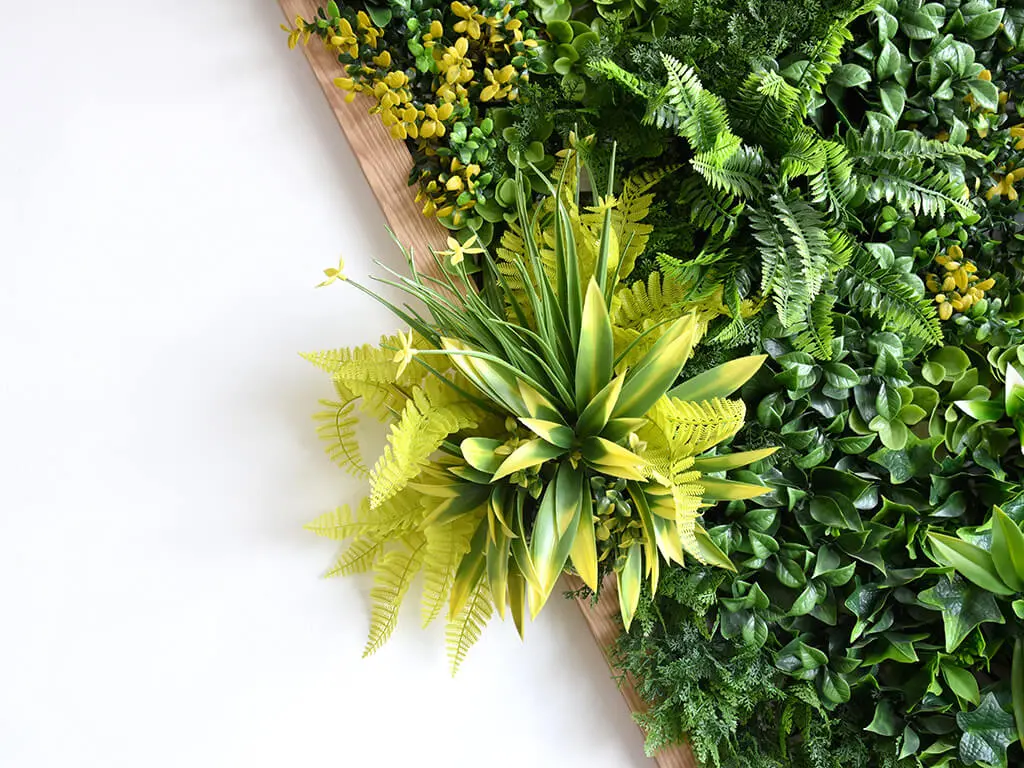 ARTIFICIAL EVERGREEN BRANCHES IN GREEN WALLS 1 Artificial Evergreen Branches