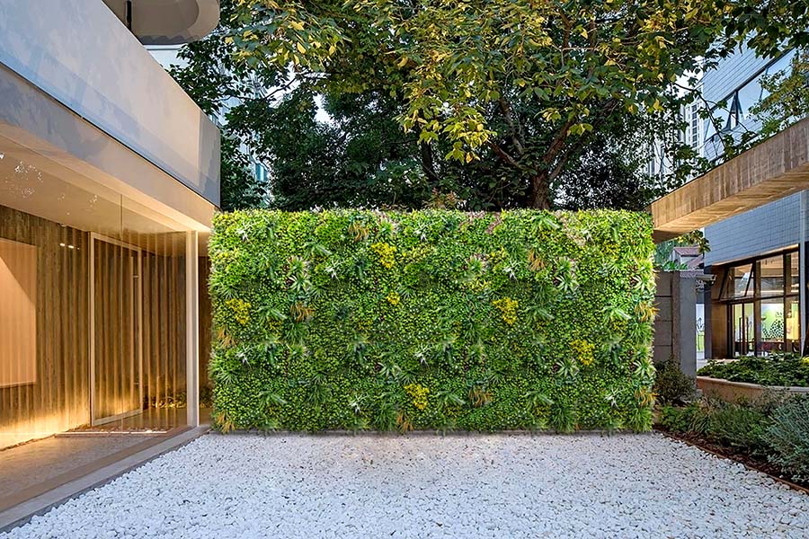 Is it OK to put fake plants outside? 1 greenery wall